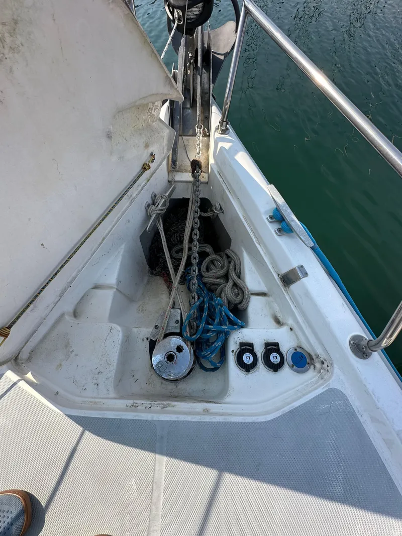 Slide: The Image of Anchor locker of 2001 Hunter 380 sailboat with ropes and chain. - 13