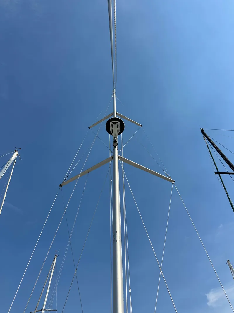 Slide: The Image of Sailboat mast against clear blue sky, Hunter 380, 2001 model. - 15