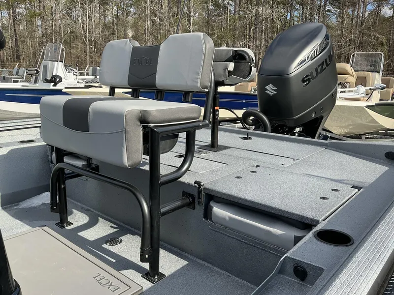 Slide: The Image of 2025 Excel New Bay Pro 230 SEADECK boat with Suzuki engine, featuring comfortable seating. - 9