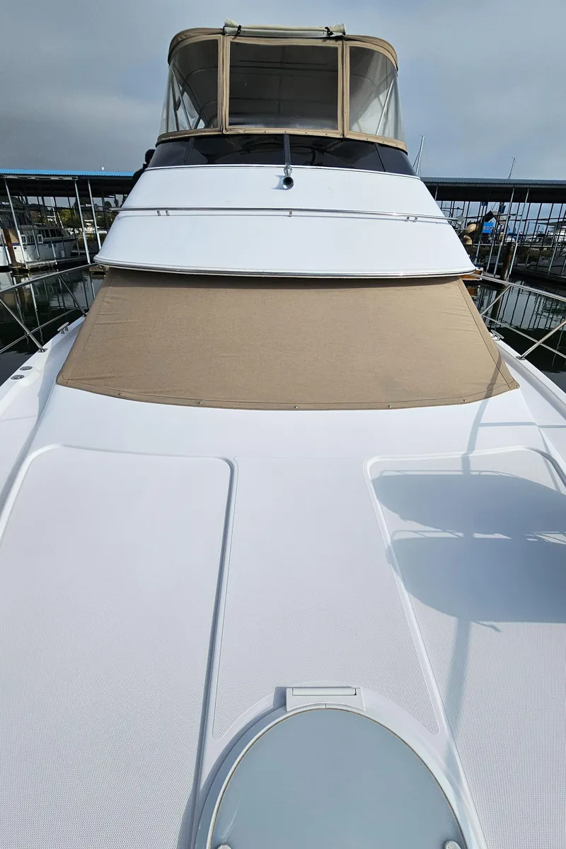 Slide: The Image of 2002 Carver 396 Motor Yacht with sleek design and spacious deck. - 18