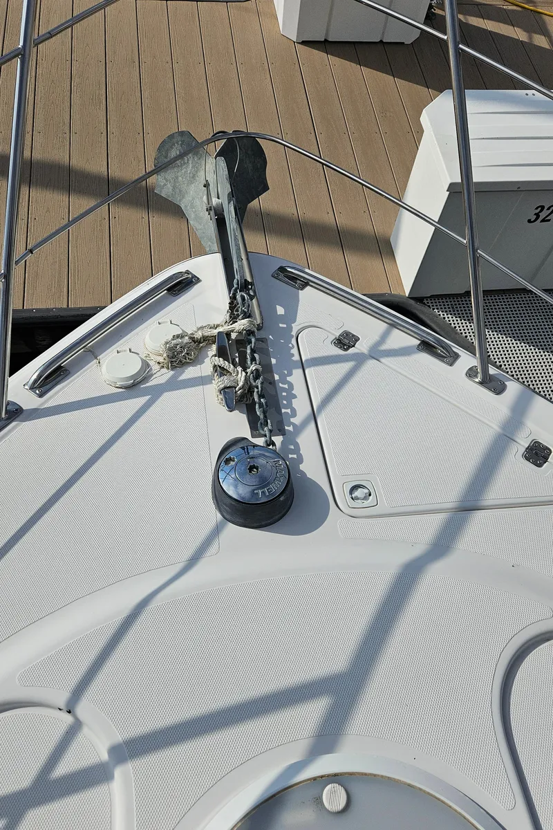 Slide: The Image of Bow of 2002 Carver 396 Motor Yacht with anchor and deck details. - 20