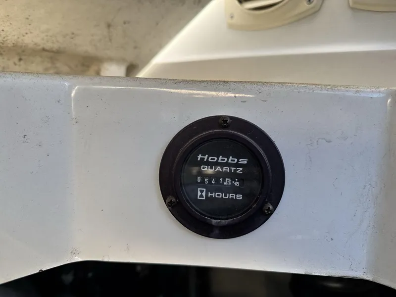 Slide: The Image of Hobbs quartz hour meter on 2000 Cobalt 293 boat, displaying 5416.1 hours. - 19