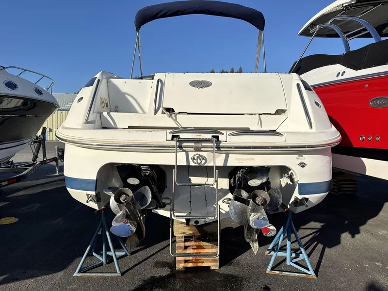 Slide: The Image of Rear view of a 2000 Cobalt 293 boat on stands, showcasing dual propellers. - 3