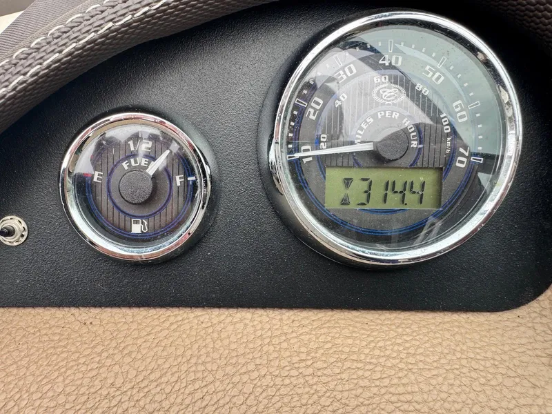 Slide: The Image of Dashboard of 2016 Cobalt 200S showing fuel gauge and speedometer. - 10