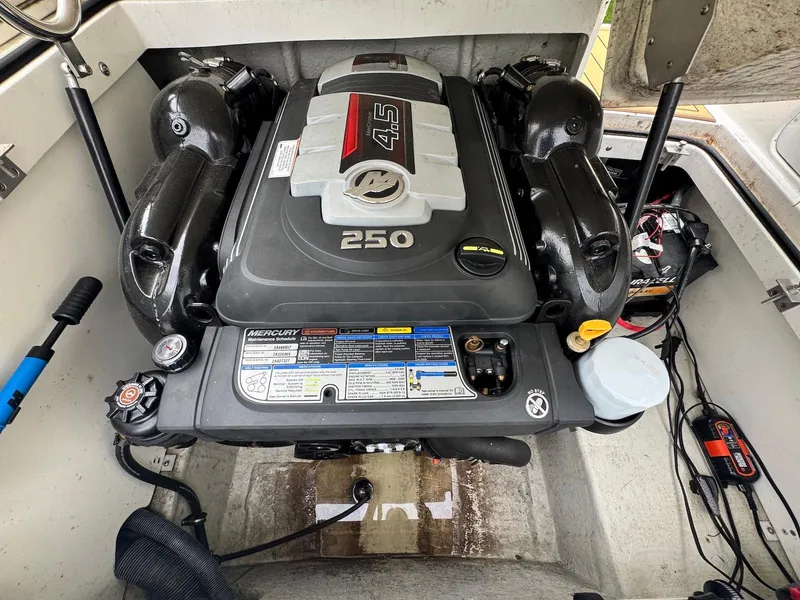 Slide: The Image of 2016 Cobalt 200S boat engine compartment with Mercury 4.5L 250 HP engine. - 18