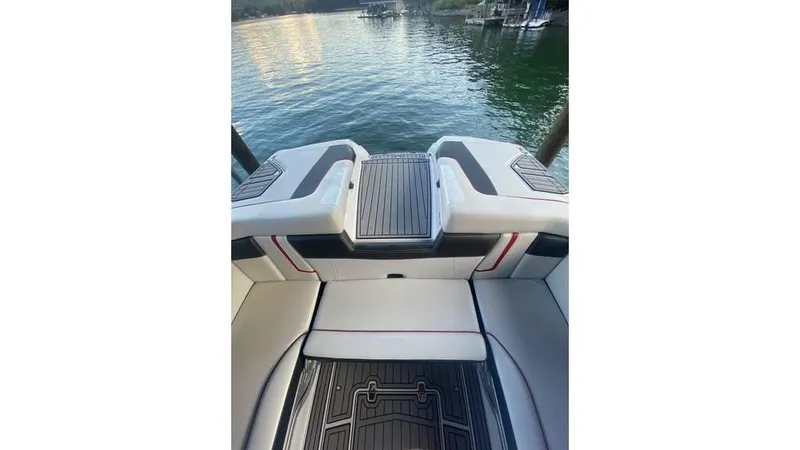 Slide: The Image of 2014 Nautique Super Air Nautique G23 boat interior with lake view. - 14