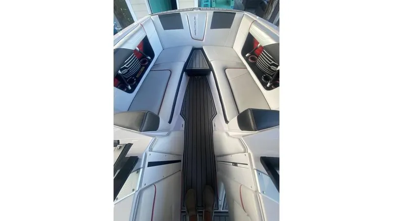 Slide: The Image of 2014 Nautique Super Air Nautique G23 interior with sleek seating and modern design. - 3