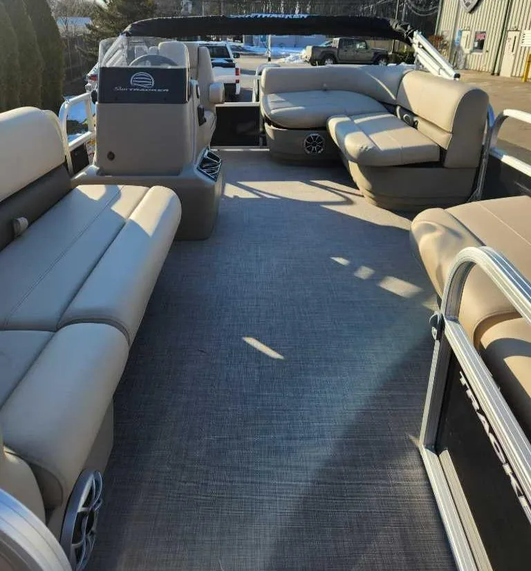 Slide: The Image of 2025 Sun Tracker Party Barge 16 DLX with spacious seating and modern design. - 2