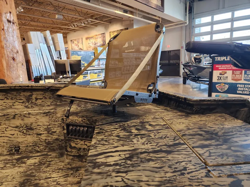 Slide: The Image of 2025 Tracker Grizzly 1650 T Prairie Wings Edition boat interior with camouflage design. - 6