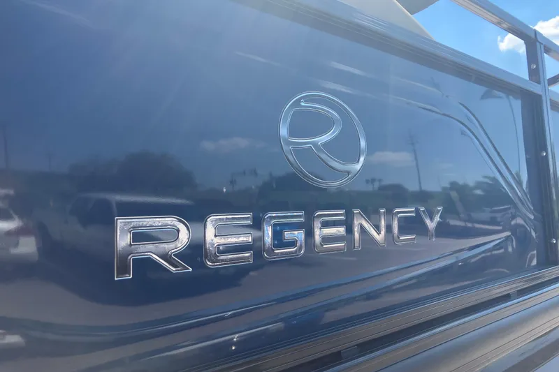 Slide: The Image of 2025 Regency 250 DL3 logo on sleek, reflective surface. - 1