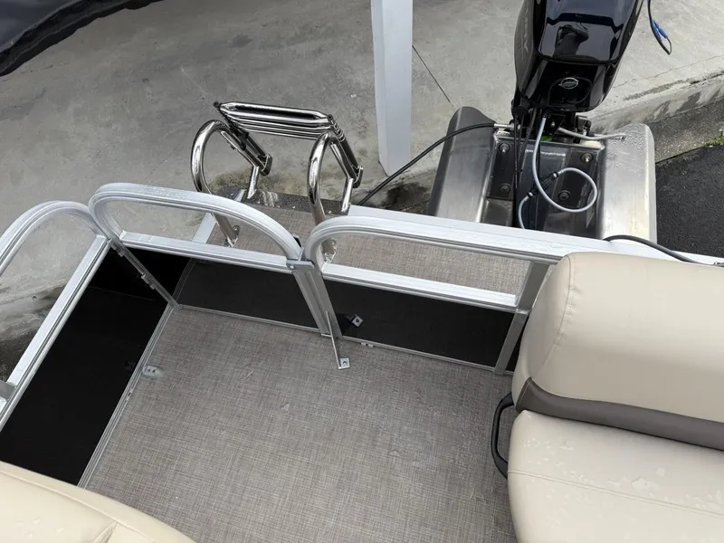 Slide: The Image of 2025 Sun Tracker Party Barge 16 DLX pontoon boat with motor and seating area. - 10