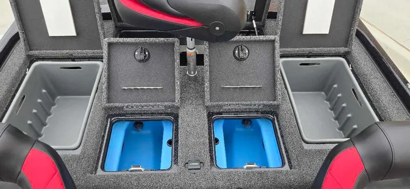 Slide: The Image of 2025 Nitro Z21 XL boat storage compartments with gray and blue interiors. - 13