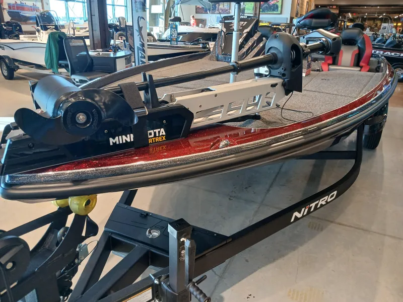 Slide: The Image of 2025 Nitro Z21 XL boat with Minn Kota trolling motor in showroom. - 6