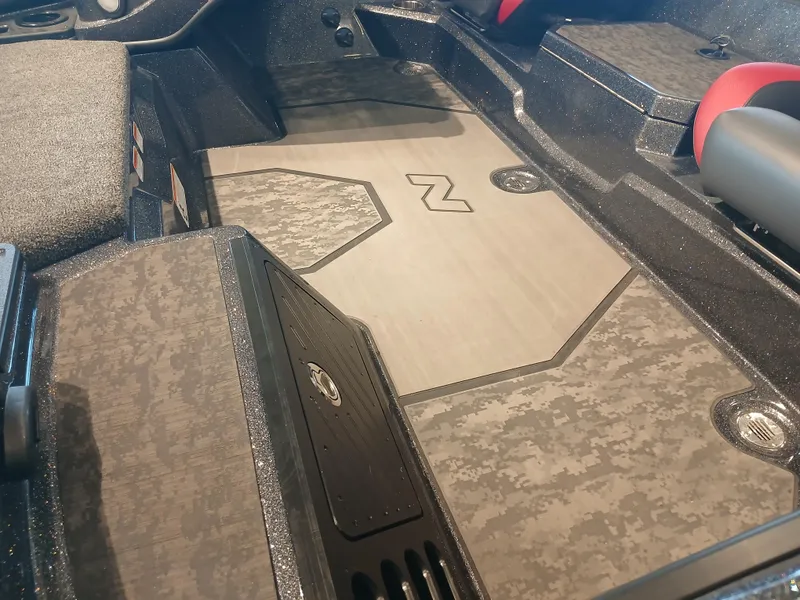 Slide: The Image of 2025 Nitro Z21 XL boat interior with sleek, modern design and textured flooring. - 9