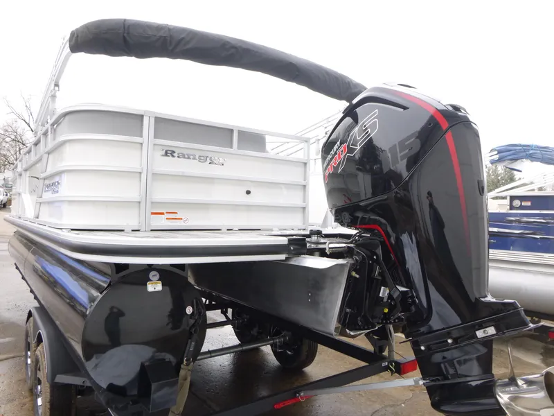 Slide: The Image of Ranger Reata 220C 2025 model emblem on a sleek silver surface. - 4