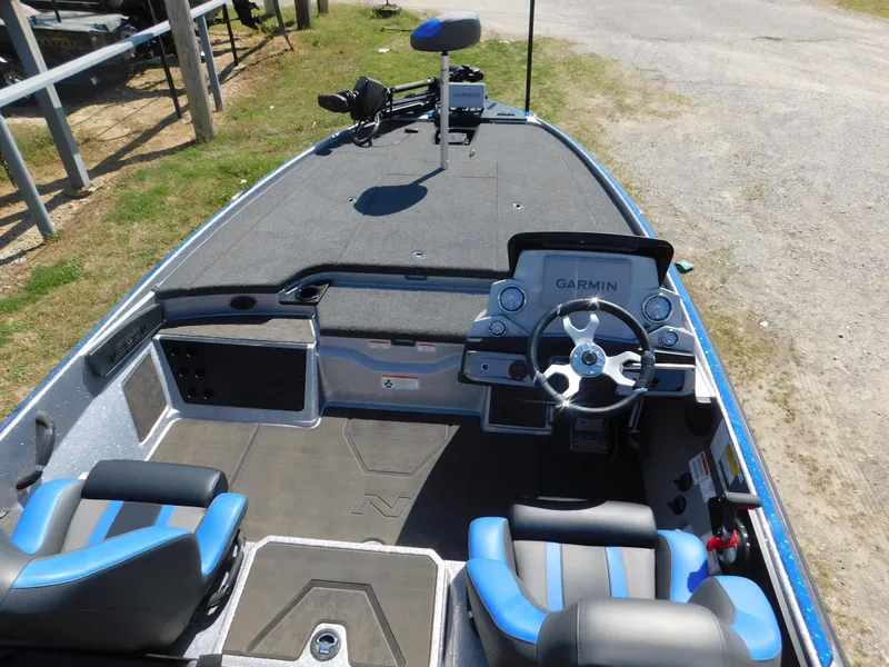 Slide: The Image of 2025 Nitro Z20 XL Pro boat interior with Garmin navigation system and dual seating. - 6
