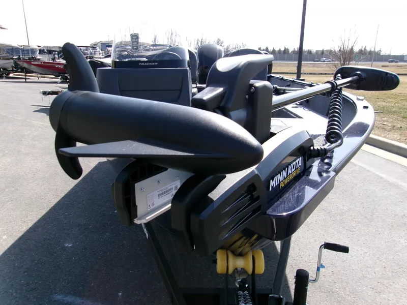 Slide: The Image of 2025 Tracker Pro Guide V-16 SC boat with Minn Kota trolling motor. - 3