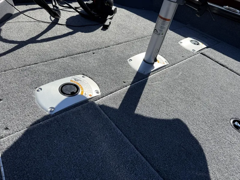 Slide: The Image of 2025 Tracker Pro Team 175 Crappie Edition boat deck with adjustable seat mounts. - 7