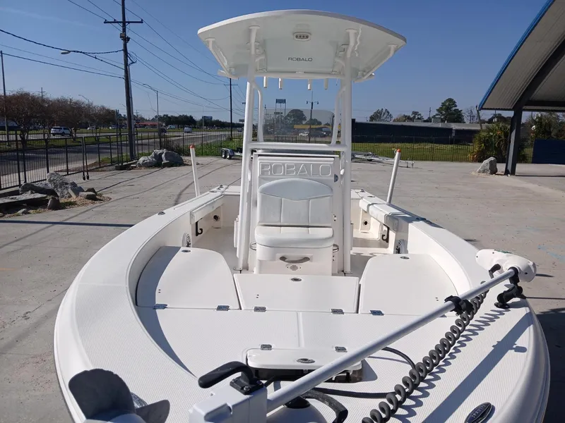 Slide: The Image of 2018 Robalo 226 Cayman boat, white deck, center console, outdoor display. - 10