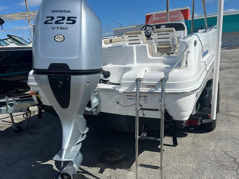 Slide: The Image of 2022 Hurricane Center Console SS 231 OB boat with Honda 225 VTEC outboard motor. - 1