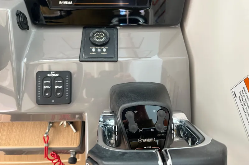 Slide: The Image of Control panel of 2019 Pursuit DC 325 Dual Console with Yamaha throttle. - 24