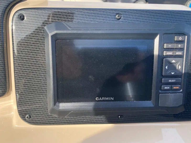 Slide: The Image of Garmin display on 2025 SunCatcher Select 322RC boat dashboard. - 16