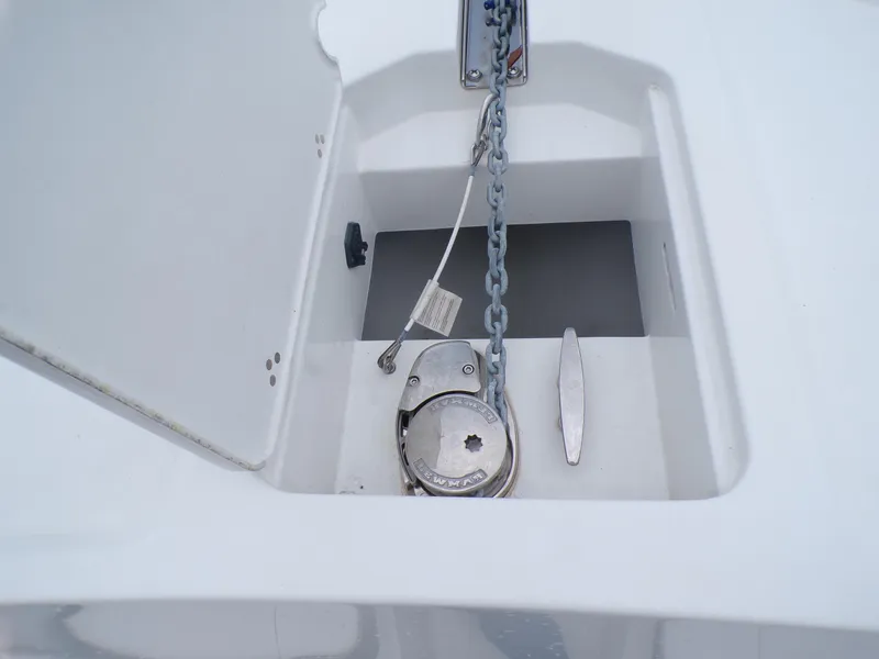 Slide: The Image of 2024 Parker 2400 Center Console anchor locker with chain and winch. - 10