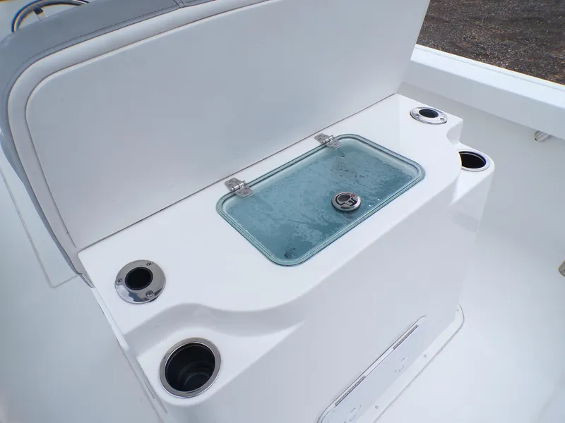 Slide: The Image of 2024 Parker 2400 Center Console boat with livewell and cup holders on deck. - 7