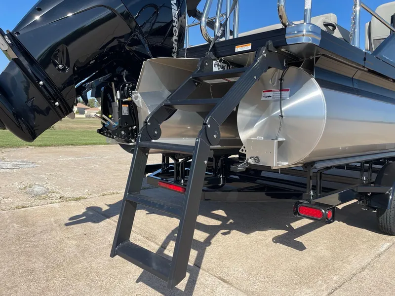 Slide: The Image of 2024 Barletta Cabrio 22UC pontoon boat rear view with ladder and motor. - 10