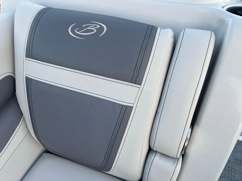 Slide: The Image of 2024 Barletta Cabrio 22UC boat seat with logo, featuring gray and white upholstery. - 26