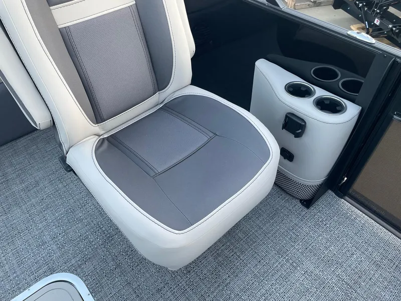 Slide: The Image of 2024 Barletta Cabrio 22UC boat interior with gray seating and cup holders. - 28
