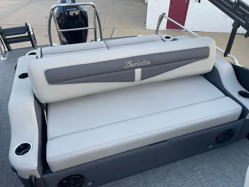 Slide: The Image of 2024 Barletta Cabrio 22UC boat seat with cup holders and sleek design. - 30
