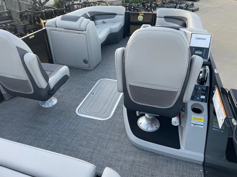 Slide: The Image of 2024 Barletta Cabrio 22UC interior with gray seating and modern dashboard. - 34