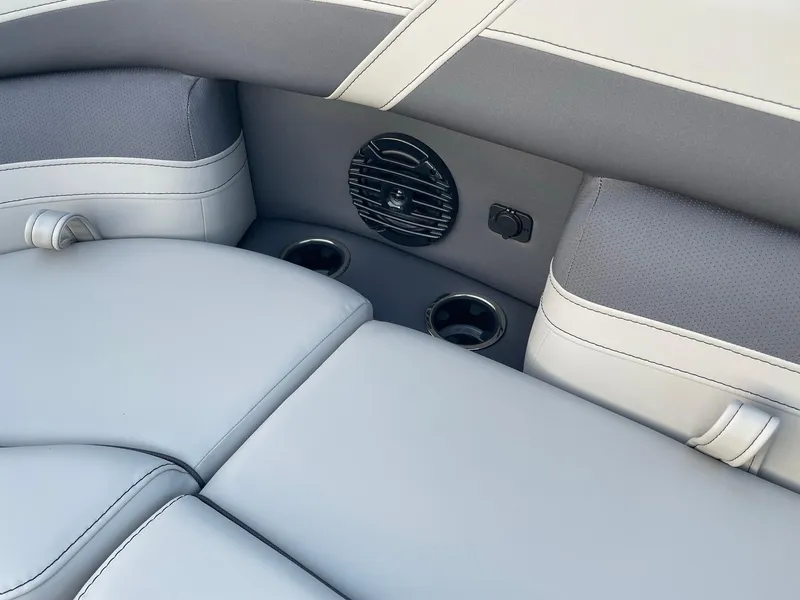 Slide: The Image of 2024 Barletta Cabrio 22UC boat interior with gray seating and cup holders. - 40