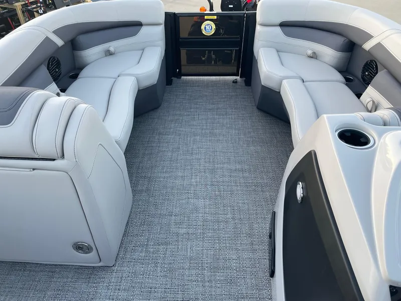 Slide: The Image of 2024 Barletta Cabrio 22UC interior with gray seating and carpeted flooring. - 42