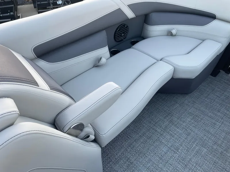 Slide: The Image of 2024 Barletta Cabrio 22UC interior seating with gray upholstery and armrests. - 43