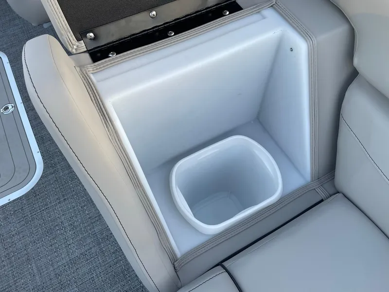 Slide: The Image of 2024 Barletta Cabrio 22UC boat seat storage compartment with integrated cooler. - 44