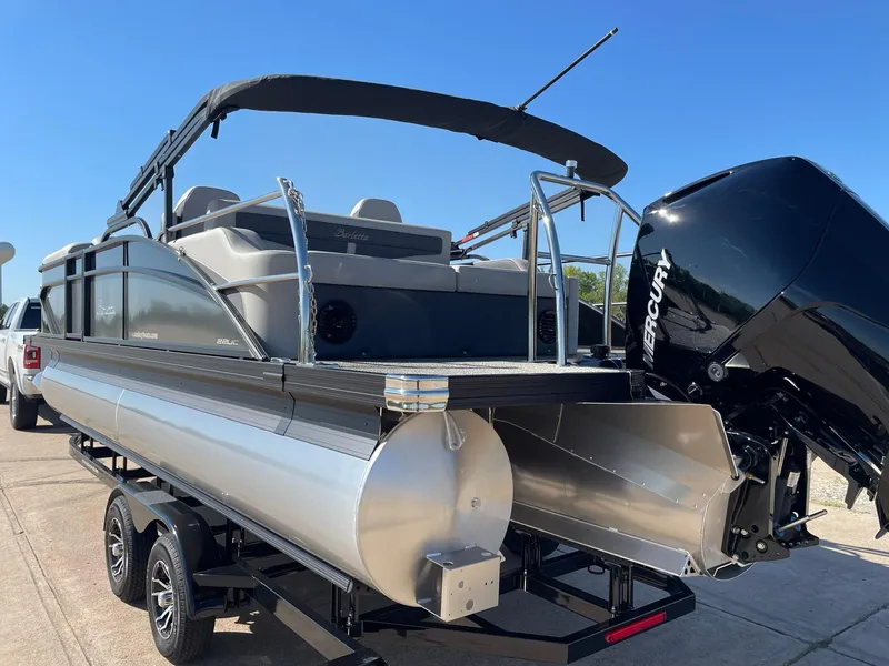 Slide: The Image of 2024 Barletta Cabrio 22UC pontoon boat with Mercury engine on trailer. - 7