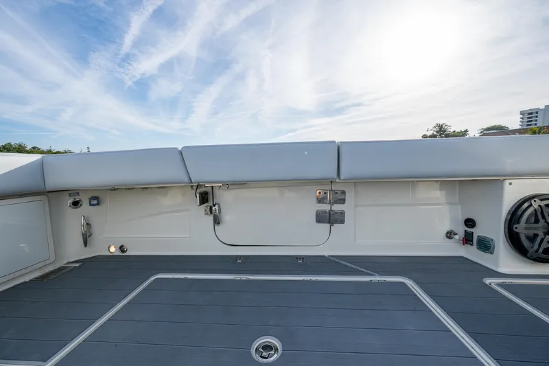 Slide: The Image of HCB 53 boat deck, 2017 model, featuring sleek design and modern amenities. - 10