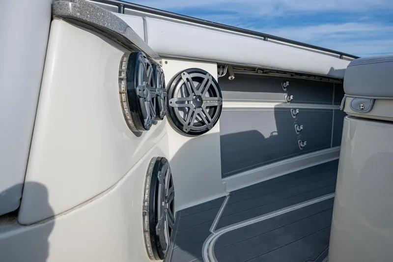Slide: The Image of HCB 53 boat interior, 2017 model, featuring sleek speakers and modern design elements. - 20