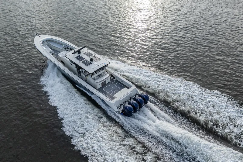 Slide: The Image of HCB 53 boat from 2017 cruising on water, aerial view. - 30