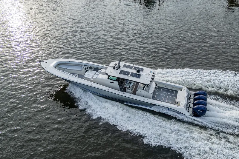 Slide: The Image of HCB 53 boat from 2017 cruising on water, aerial view. - 9