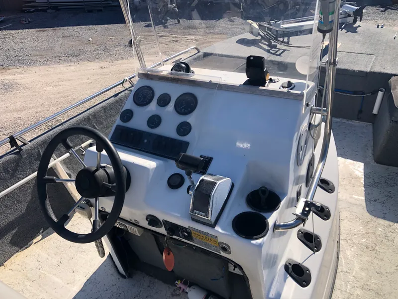 Slide: The Image of Steering console of a 1996 Skeeter ZX200 boat. - 4