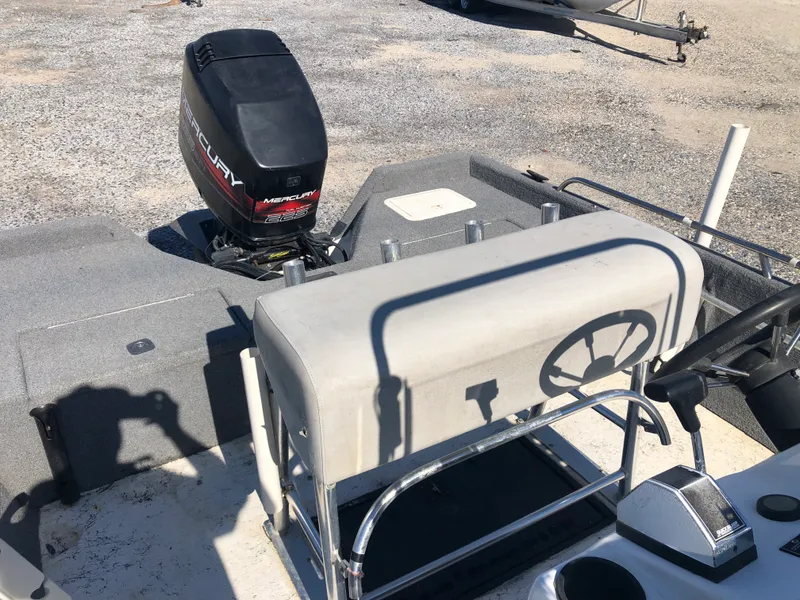 Slide: The Image of 1996 Skeeter ZX200 boat with Mercury engine, helm view. - 5