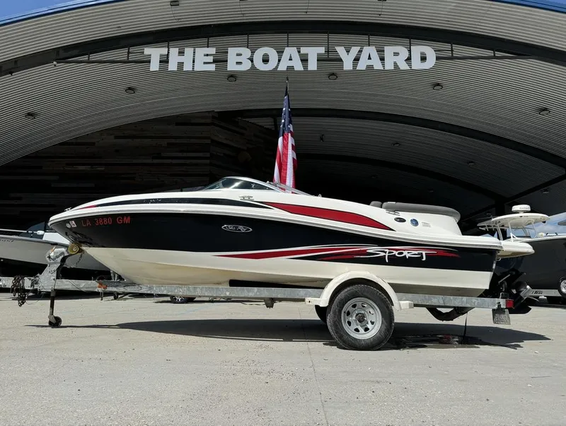 Slide: The Image of 2011 Sea Ray 185 Sport boat on trailer at The Boat Yard. - 0