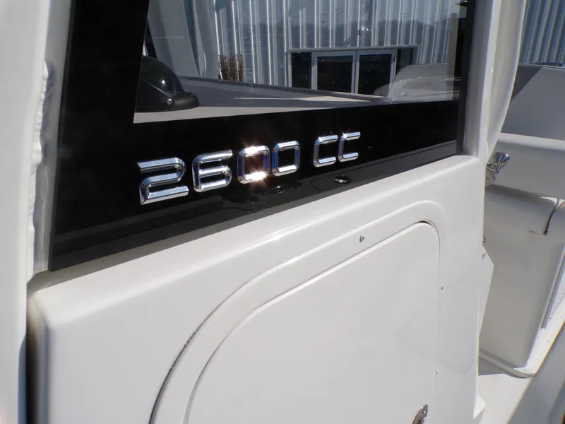 Slide: The Image of 2024 Parker 2600 Center Console boat detail with model name on side panel. - 11
