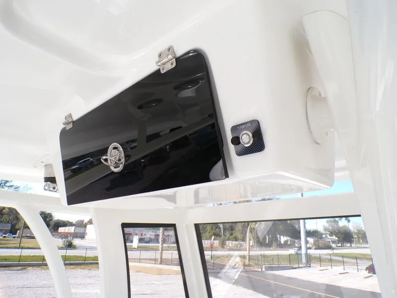Slide: The Image of 2024 Parker 2600 Center Console boat interior storage compartment detail. - 17