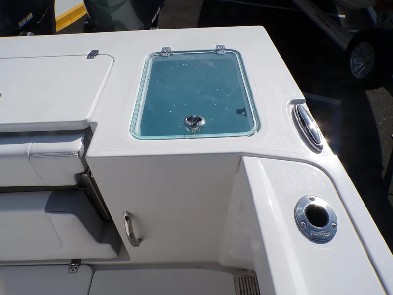 Slide: The Image of 2024 Parker 2600 Center Console boat with livewell and rod holder. - 31