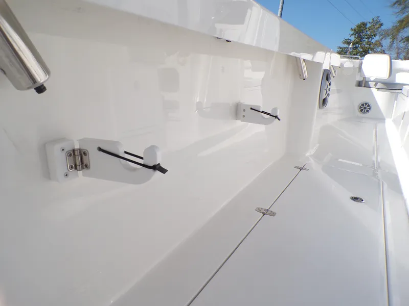 Slide: The Image of 2024 Parker 2600 Center Console boat interior, showcasing sleek white design and modern features. - 33