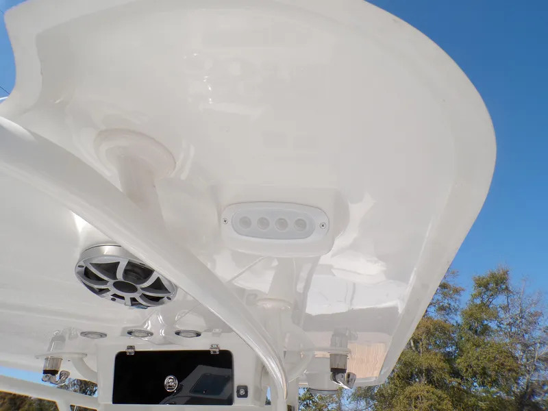 Slide: The Image of 2024 Parker 2600 Center Console boat roof with speaker and light fixtures. - 38